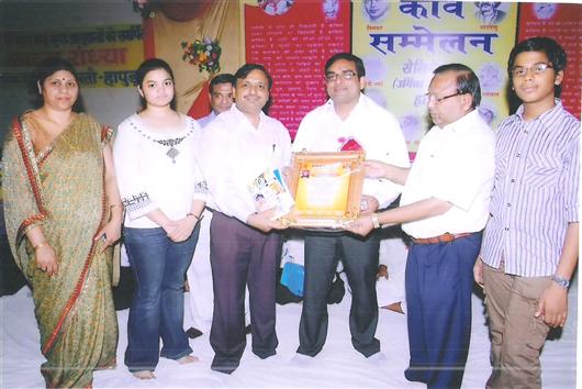 reciving award of ras bharti